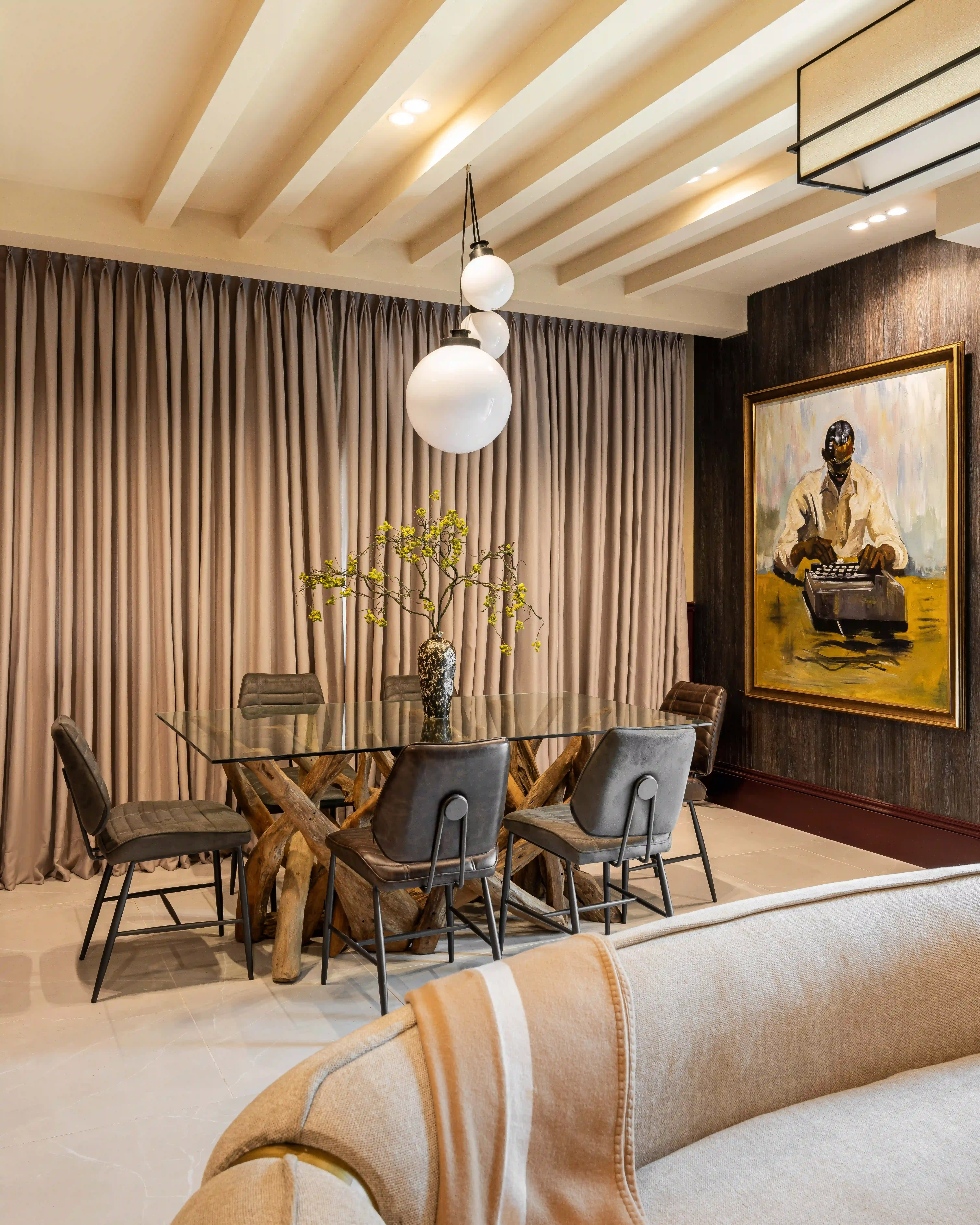 Modern dining room with warm tones and contemporary furniture